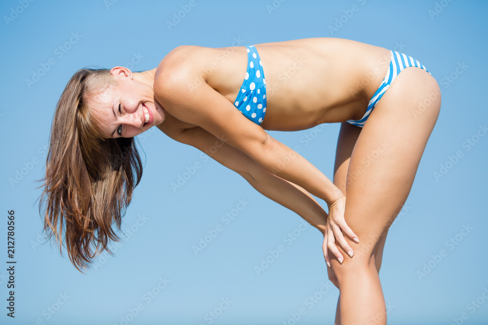 bending over in bikini