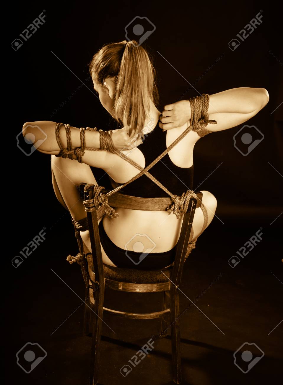 cristal duncan add photo tied to chair