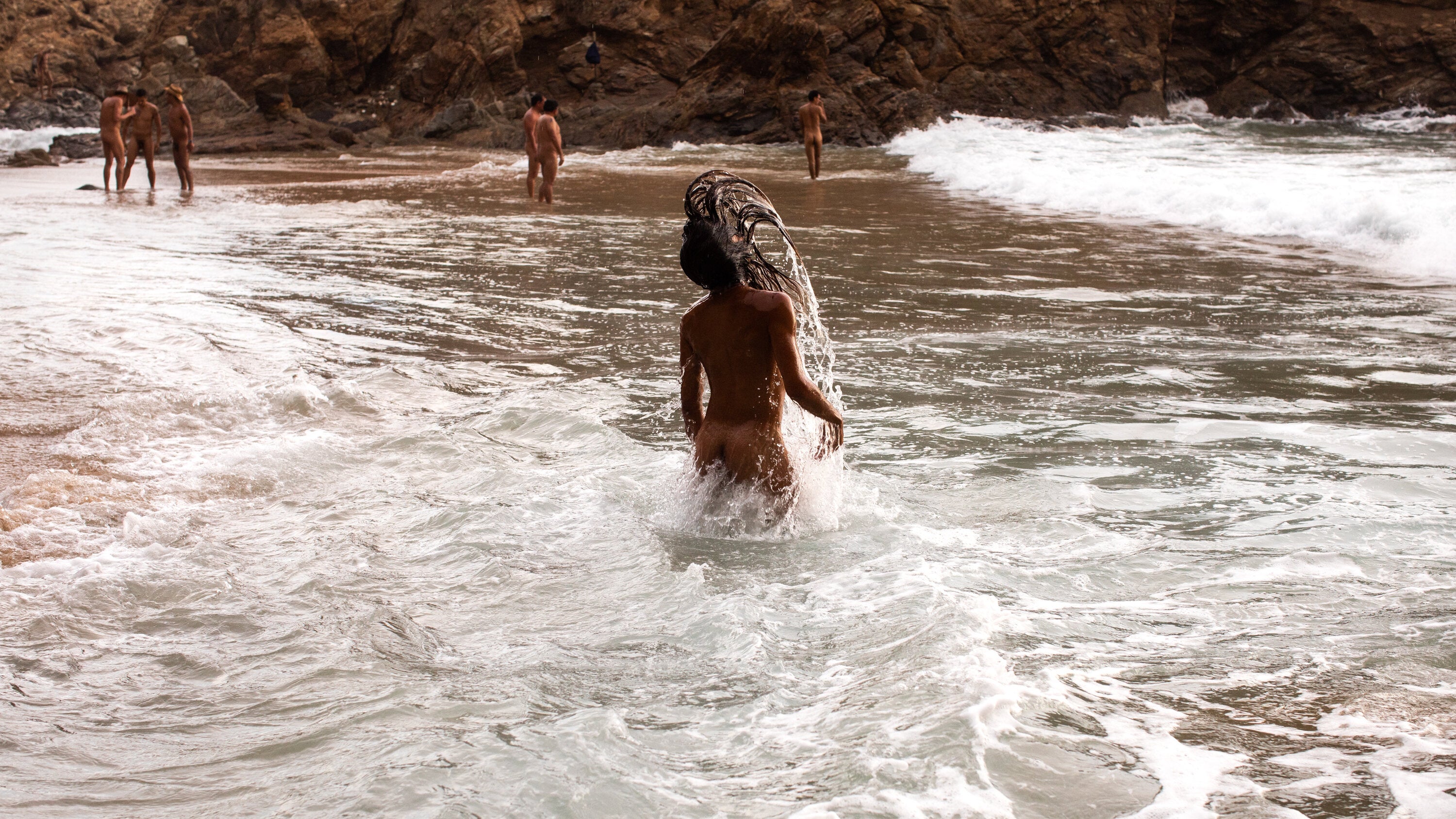 naked gay guys on the beach